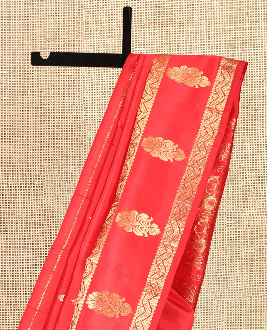 Red Kanchipuram Silk Saree, Detailed with Zari Buttas, Highlighted by a One-Sided Rettai Pettu Zari Border, Floral Design Pallu, and a No Blouse