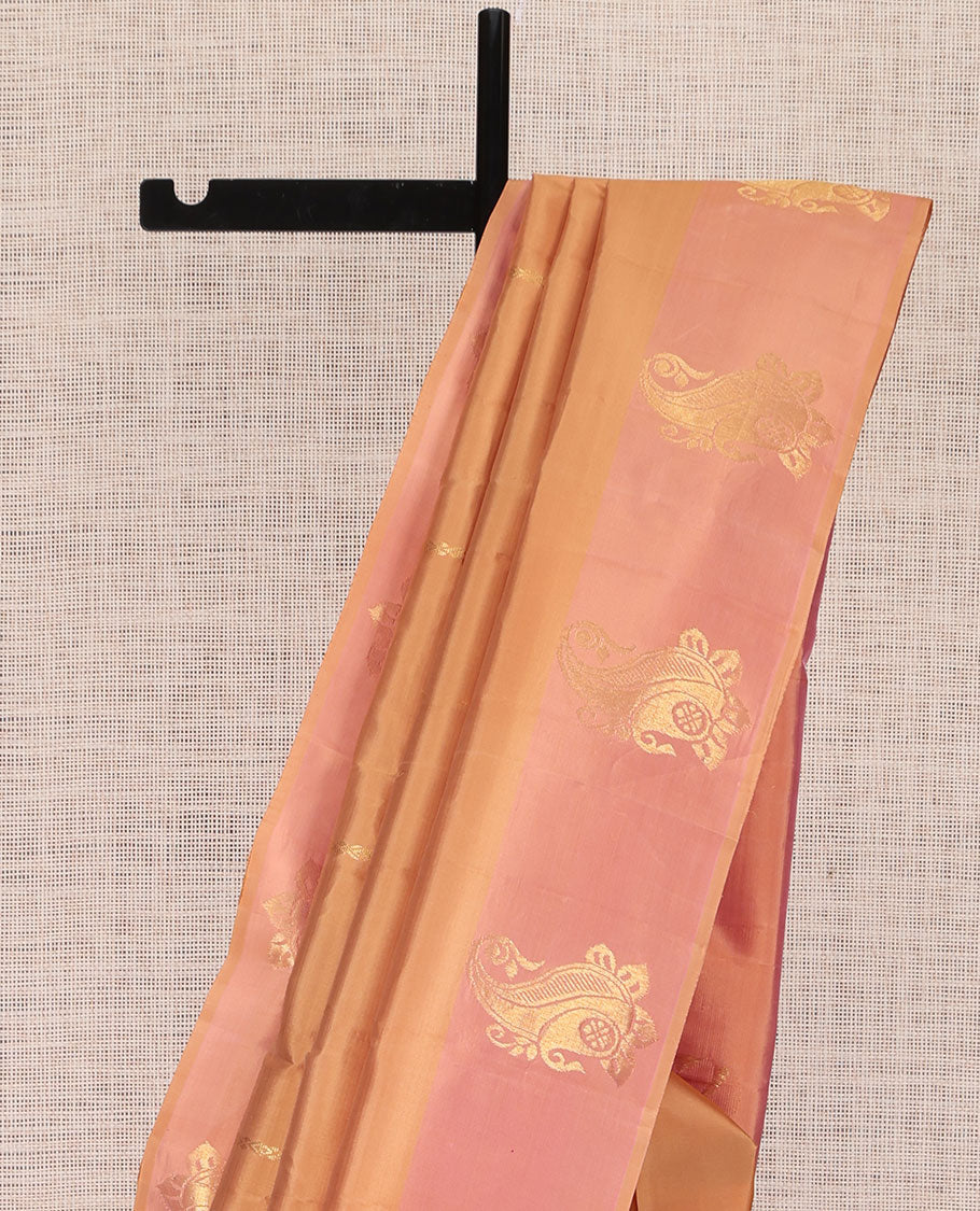 Orange Kanchipuram Silk Saree, Woven with Zari Buttas, Complemented by Semi Contrast Manga Motif Border, Pallu of Zari Design, and a Contrast Blouse