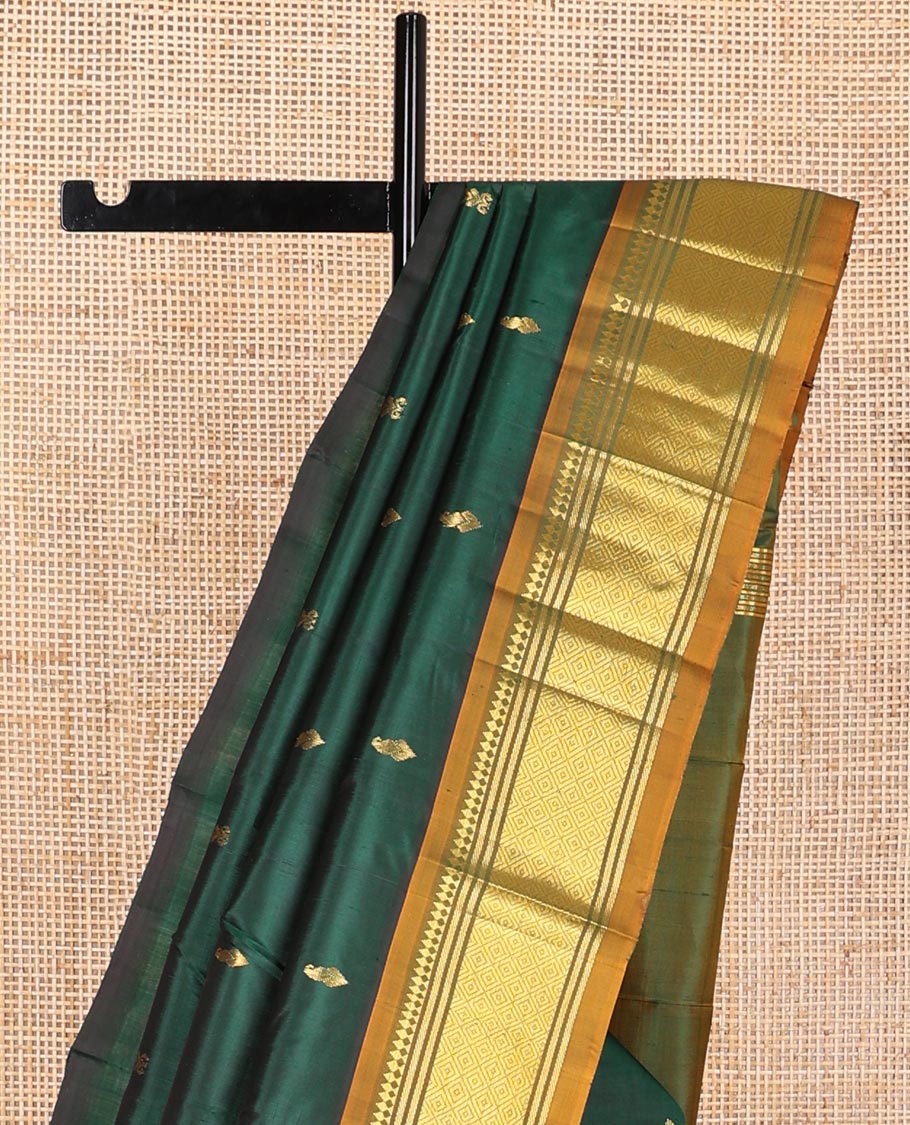 Bottle green buttas kancheepuram silk saree with contrast border of thilakam, mokku, banaras, kuyil kann design border & zari design pallu