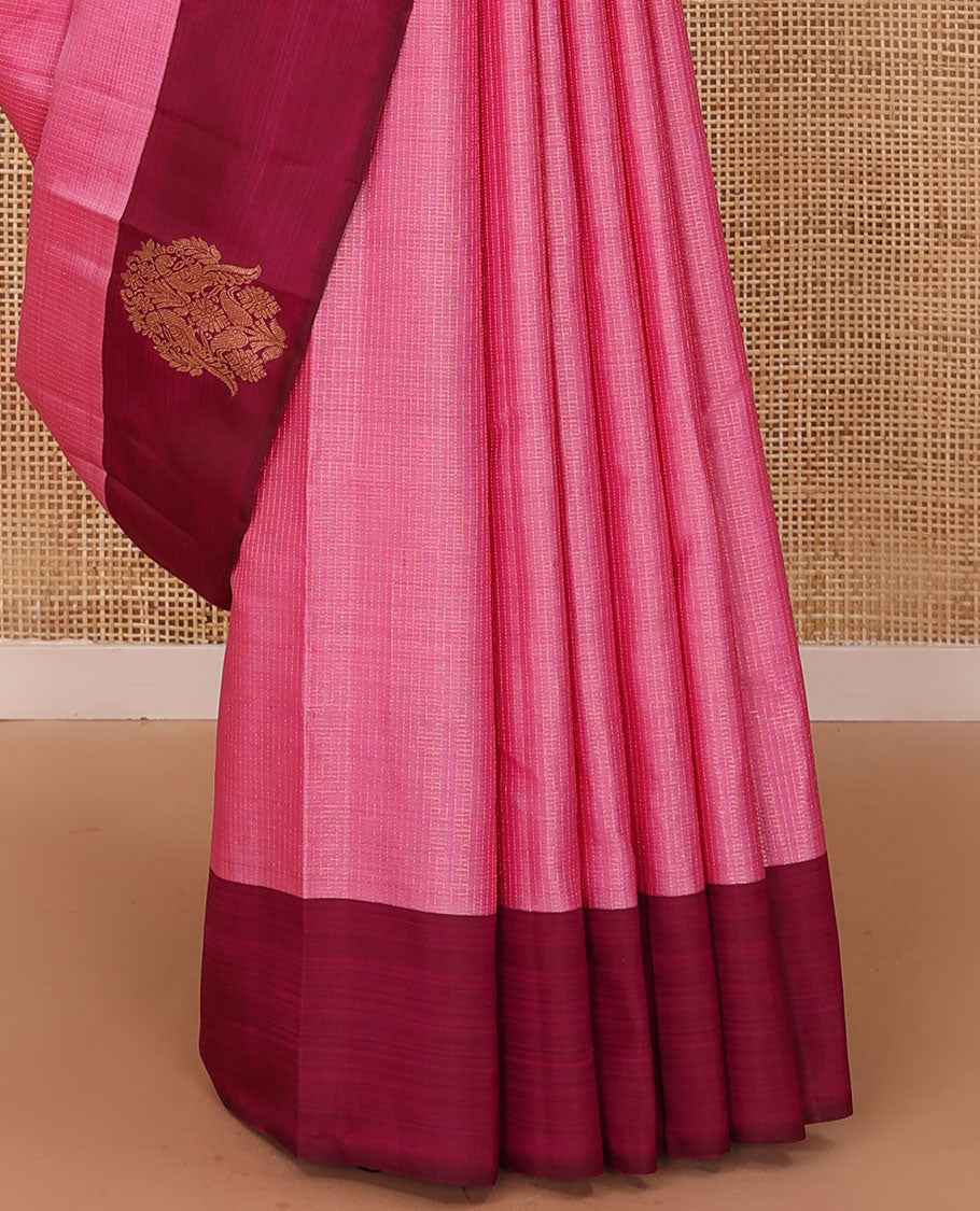 Pink zari woven Kanchipuram silk saree, contrast rettai mayil zari border, and jaal pallu