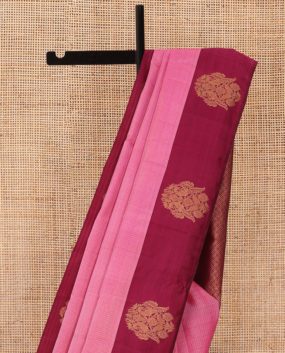 Pink zari woven Kanchipuram silk saree, contrast rettai mayil zari border, and jaal pallu
