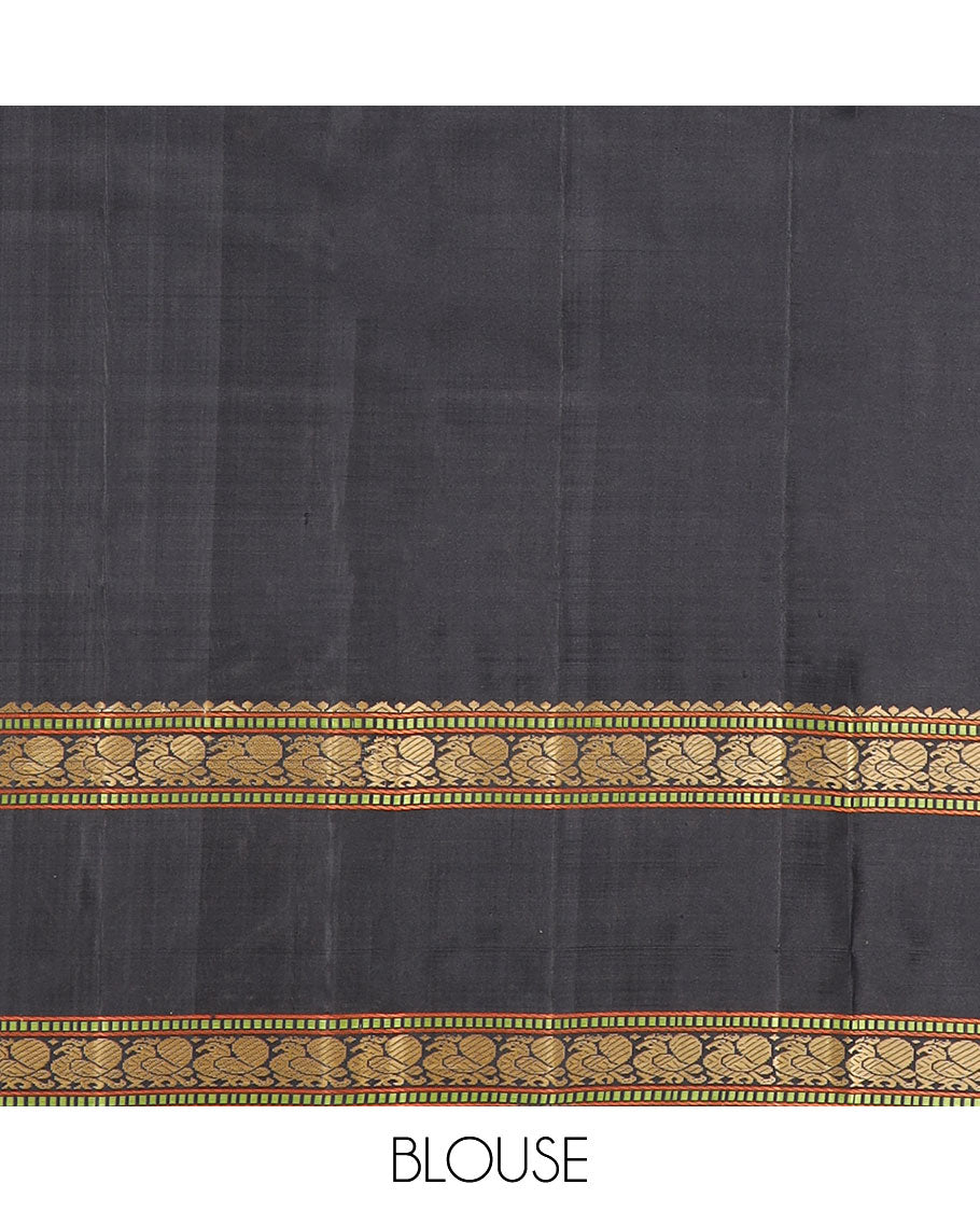 Black buttas Kanchipuram silk saree, rettai pettu border of rekku, muthu, and mayil designs, and jaal pallu