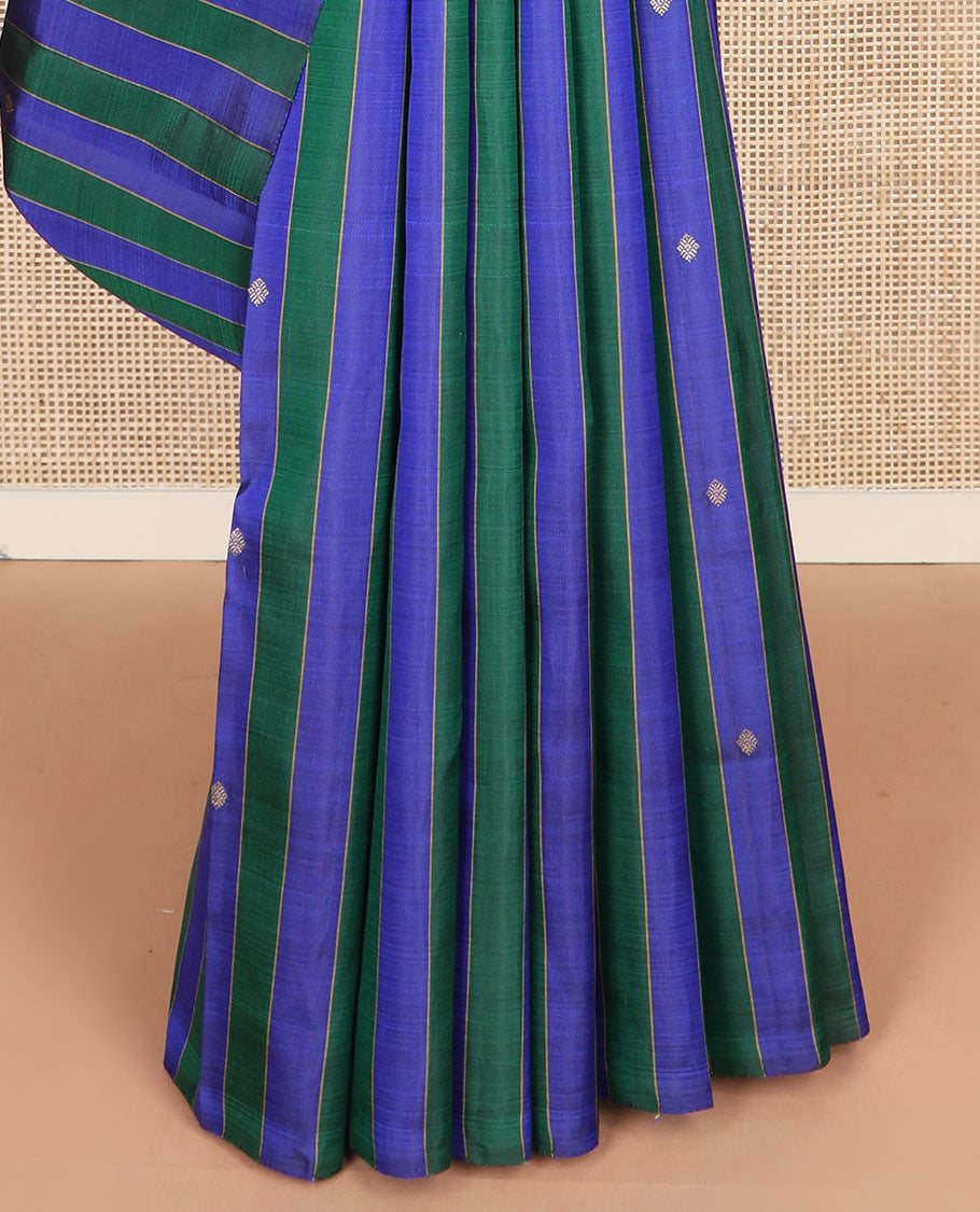 Borderless blue and green striped and buttas Kanchipuram silk saree, self-pallu features zari buttas