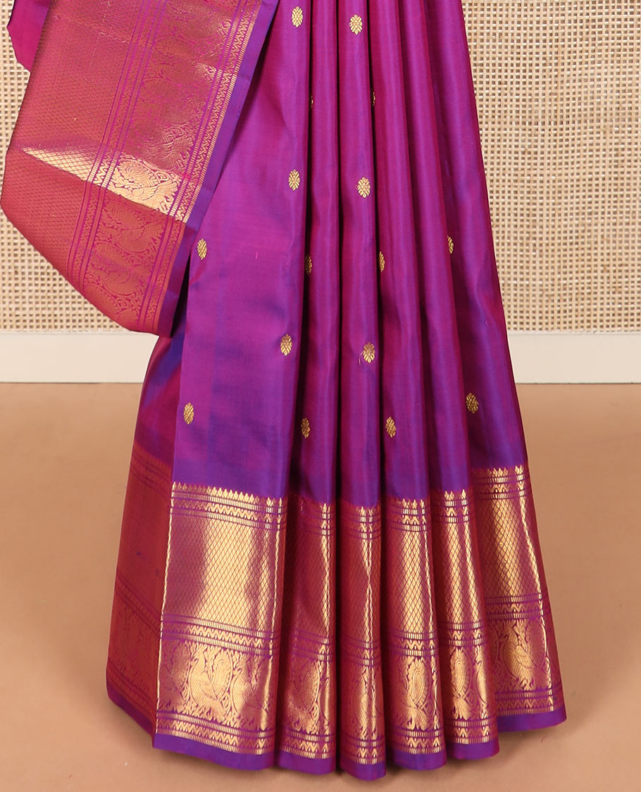 Rani pink zari buttas Kanchipuram silk saree, zari border of neli, muthu, mayil kann, and mayil designs, and pallu of traditional designs
