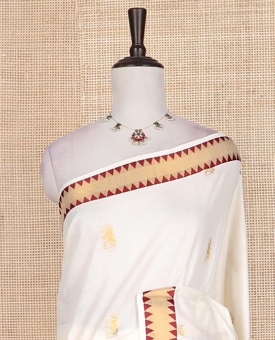 Cream gold zari buttas Kerala cotton saree, zari temple border, and pallu of intricate zari designs