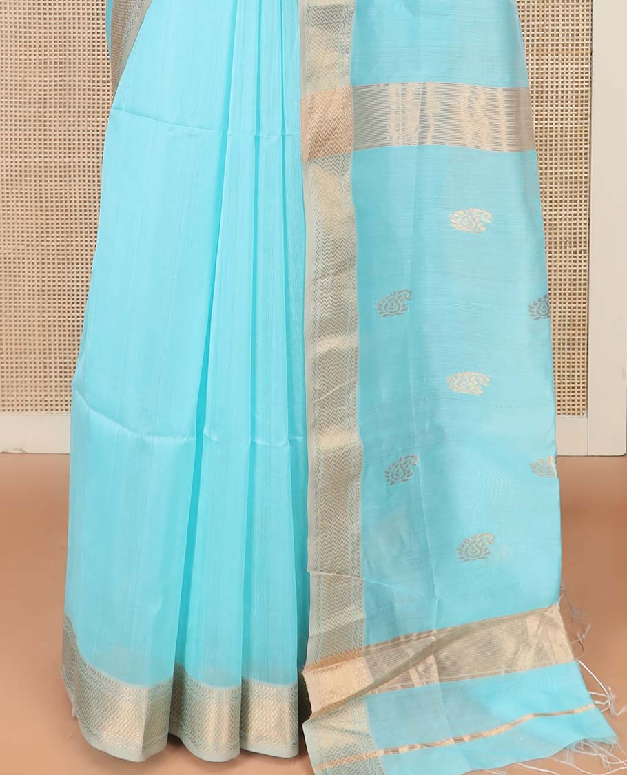 Blue Maheshwari Cotton Saree Embellished with Zari Buttas, Highlighted with Contrast Traditional Zari Design Border, Pallu Steeped with Paisley Designs, and Paired with a Contrast Blouse