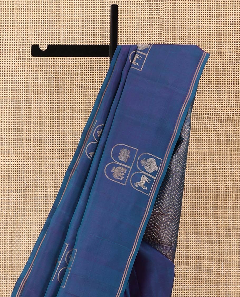 Borderless blue kuthirai, kamalam, yaanai, and Kumbha enclosed Mughal arches soft silk saree, pallu of chevron designs