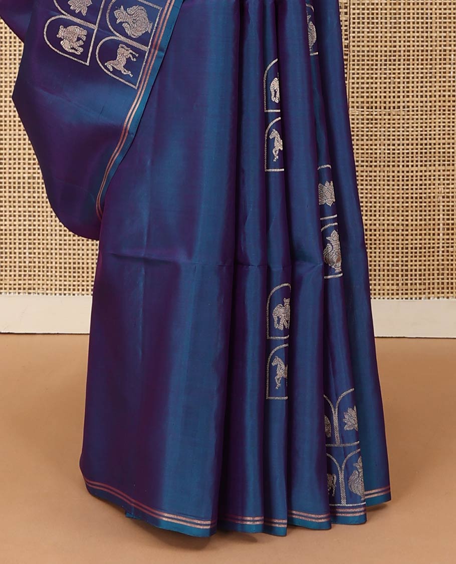 Borderless blue kuthirai, kamalam, yaanai, and Kumbha enclosed Mughal arches soft silk saree, pallu of chevron designs