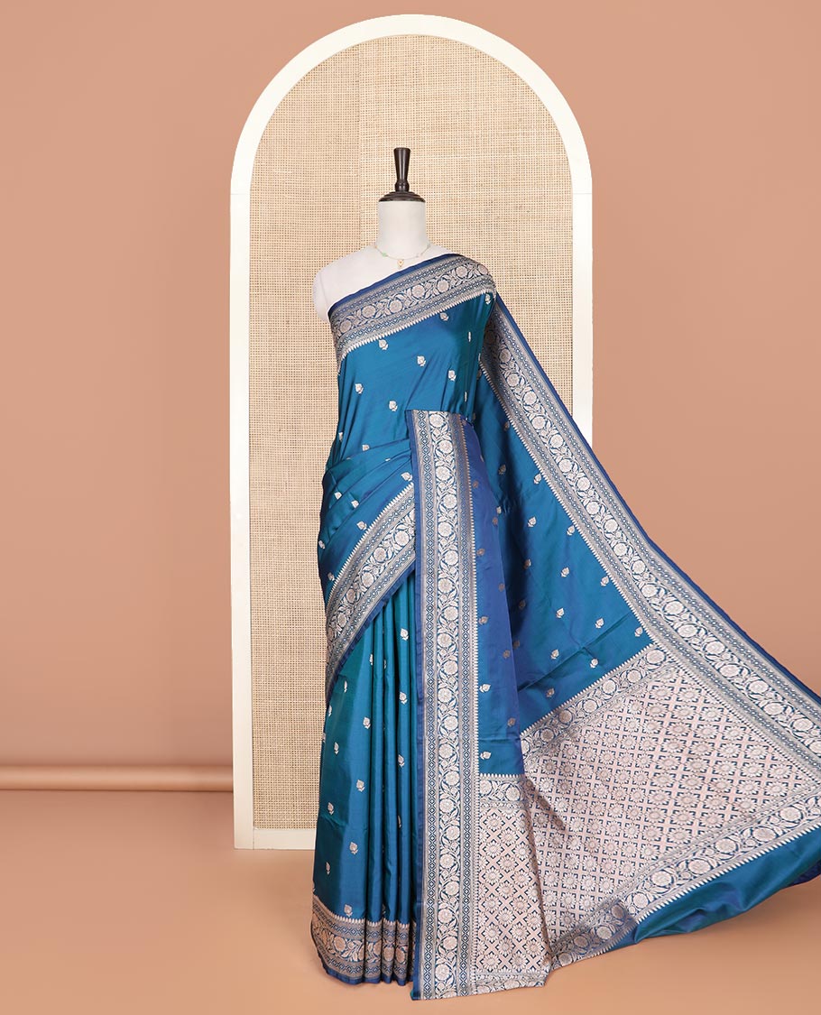 Blue floral buttas mushru silk saree, floral-creeper design zari border, and jaal pallu