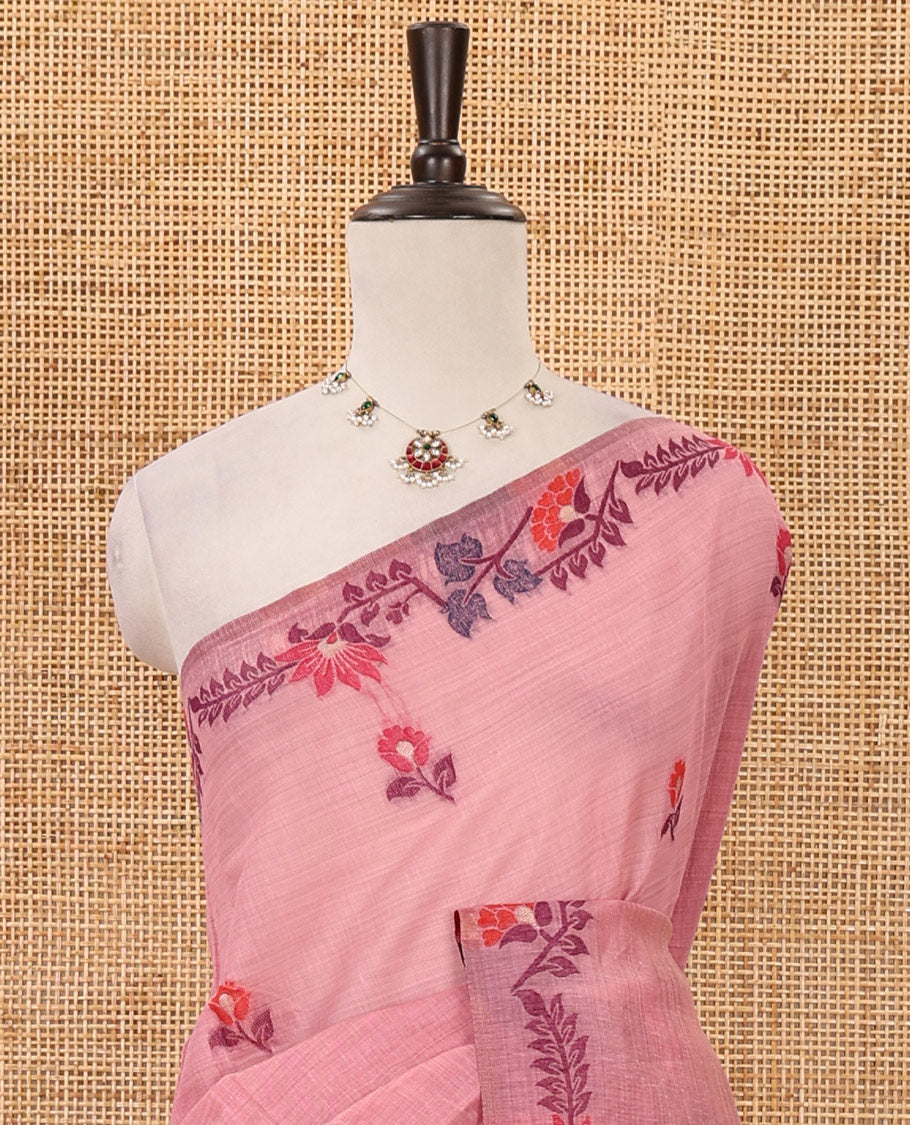 Pale pink meena buttas woven linen saree, jamdhani-style floral design woven border, floral design pallu & contrast zari butta blouse