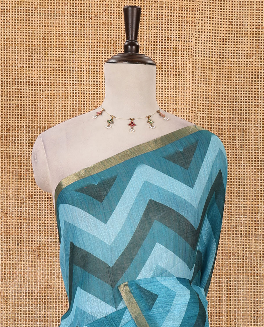 Blue zig-zag stripes printed linen cotton saree, piping zari border, kalamkari floral-peacock printed pallu & contrast printed blouse