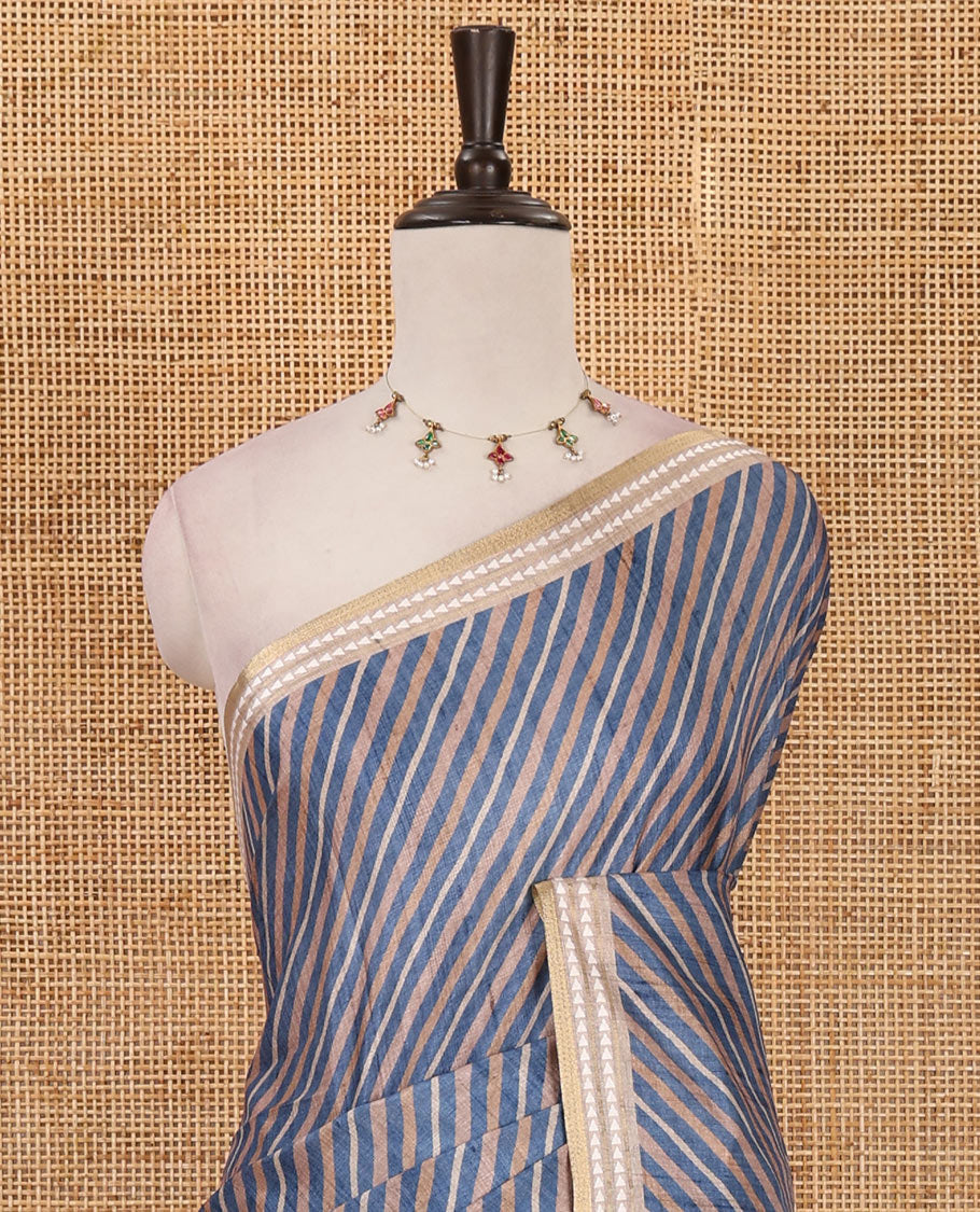 Blue lehariya-style striped semi-tussar saree, contrast resham thread triangle motifs border, diamond printed pallu & contrast printed blouse
