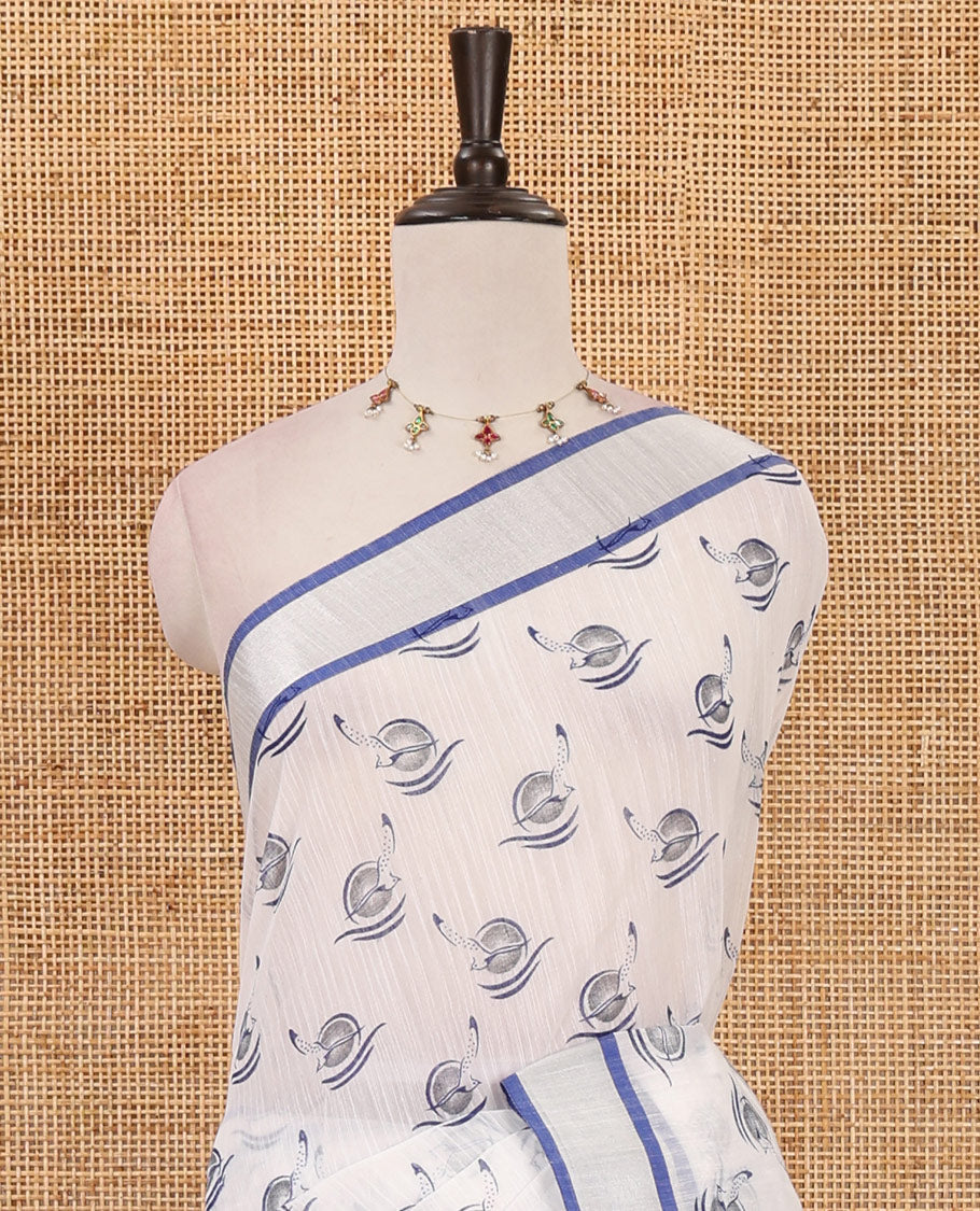 White-blue flying bird motifs printed linen saree, silver bavanji border, printed pallu & plain blouse
