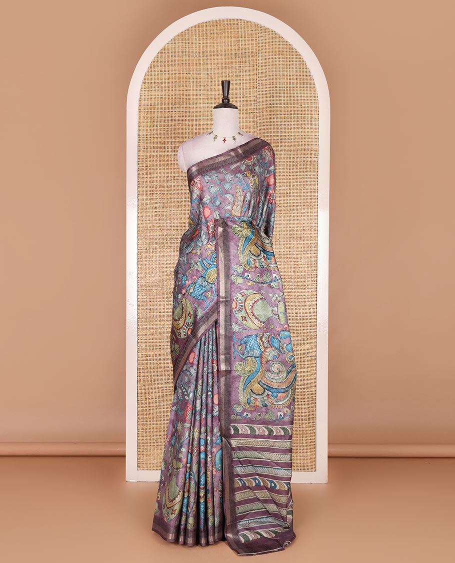 Violet-base multi-color kalamkari floral-vine and peacocks printed semi-tussar saree, gold zari piping border, kalamkari printed pallu, and contrast printed blouse