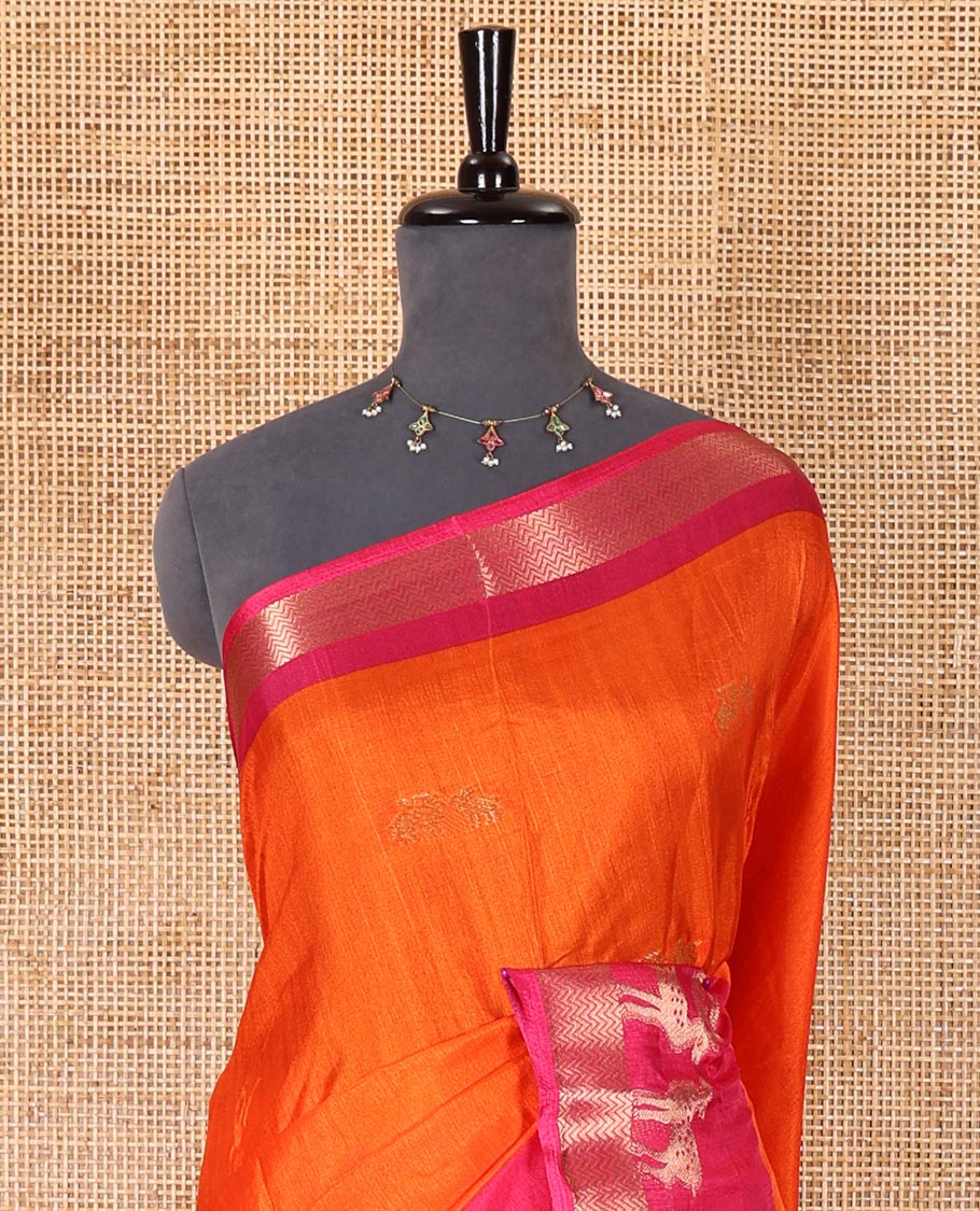 Orange deer copper zari buttas dola silk saree, contrast chevron and deer motifs zari border, deer motifs pallu, and contrast deer motifs blouse