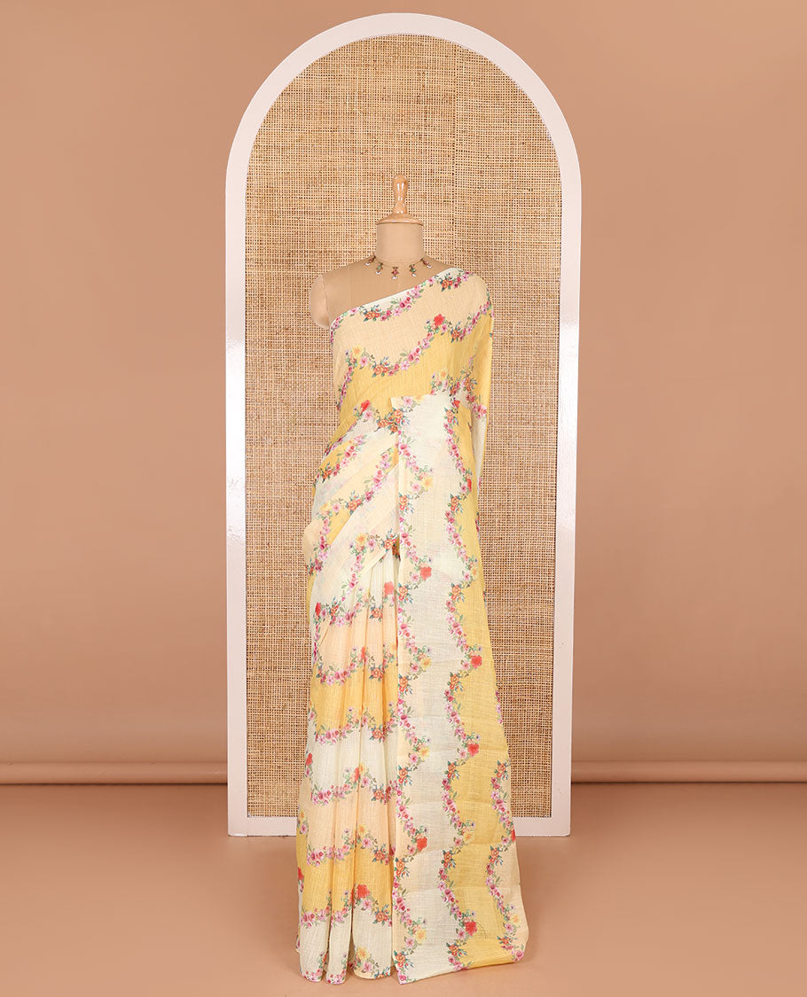 Borderless yellow rangkat style dyed and floral printed linen cotton saree with a contrast printed blouse