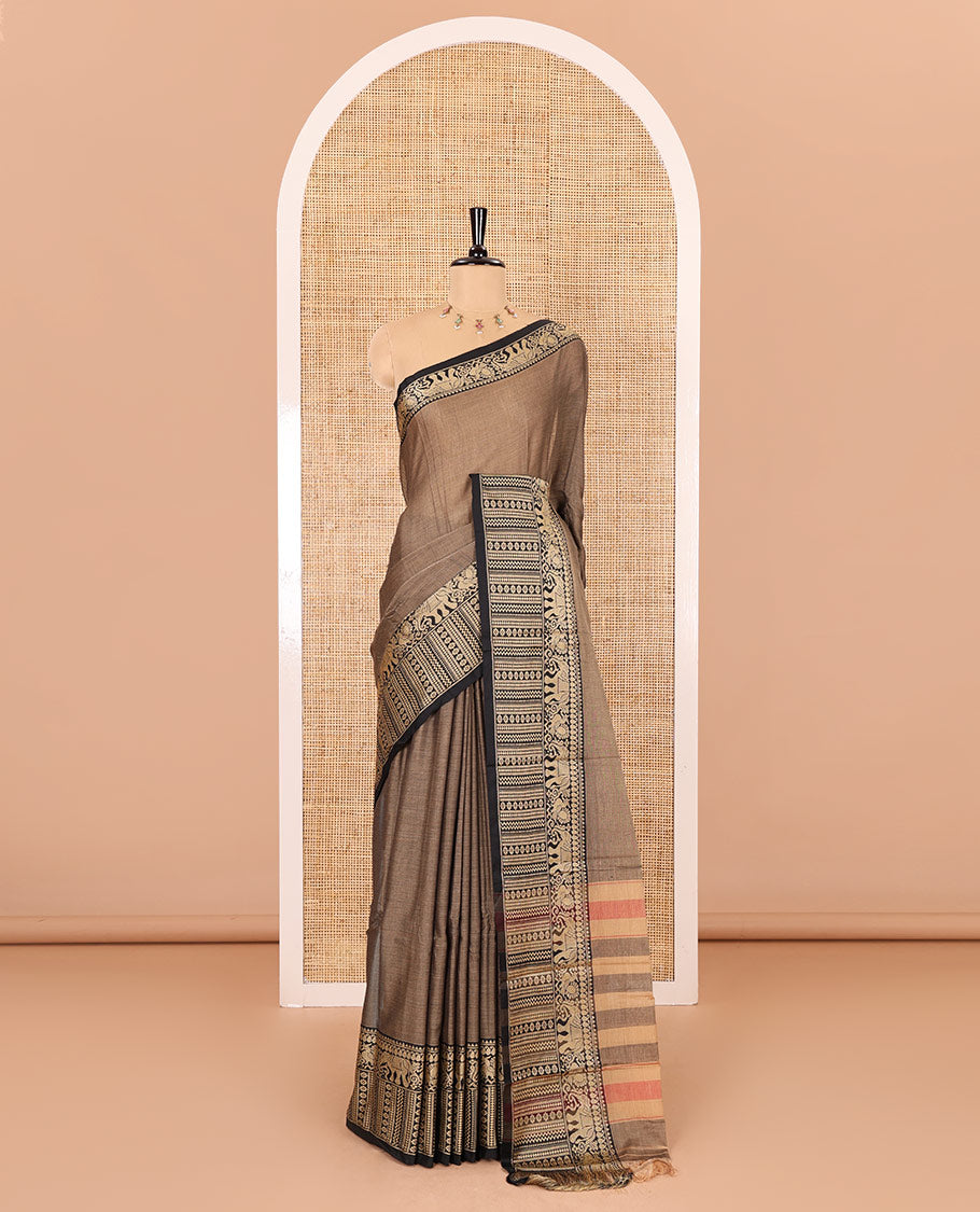 Brown plain mercerised cotton saree, contrast traditional motifs thread woven border, striped pallu, and a matching blouse