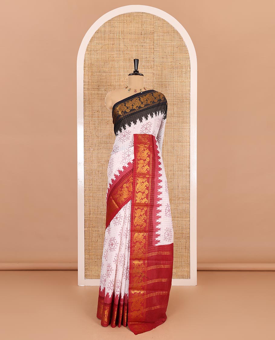 Cream gold zari checked and kolam motifs printed sungudi cotton saree, contrast ganga jamuna temple traditional zari border, zari striped pallu, and a contrast zari checked blouse