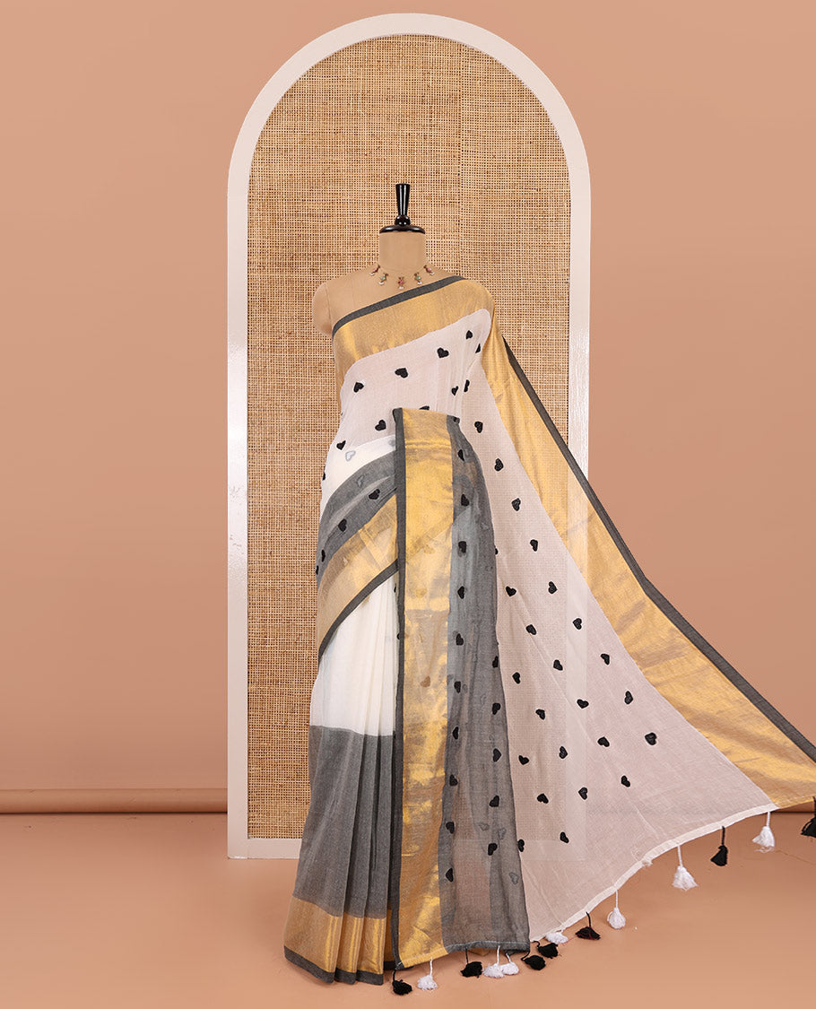 Grey heart motifs, red thread-embroidered half-and-half khadi mul cotton saree, zari border, self-pallu, and a plain blouse
