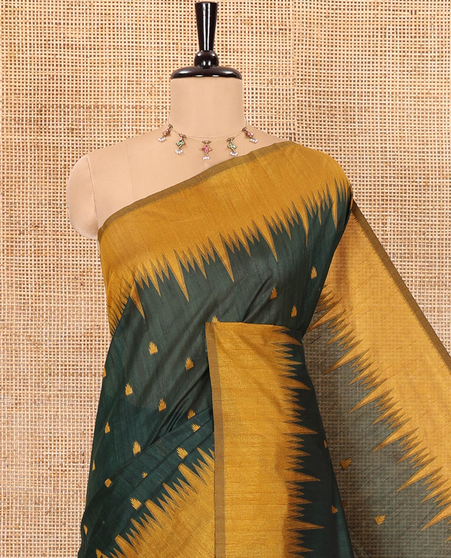 Green buttas semi-jute saree with contrast temple border, thread striped pallu, and a contrast thread buttas blouse