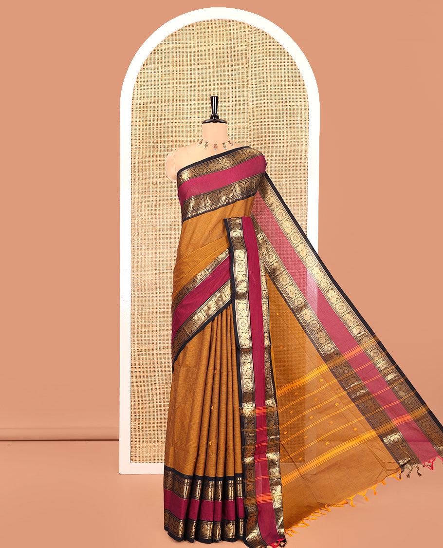 Mustard Chettinad Cotton Saree, Sparsely Woven with Buttas on Its Body, Complemented by a Contrast Rettai Pettu Border of Thilakam, and Peacock-Chakram Designs, Pallu of Stripes and Buttas, and Paired with a Matching Blouse