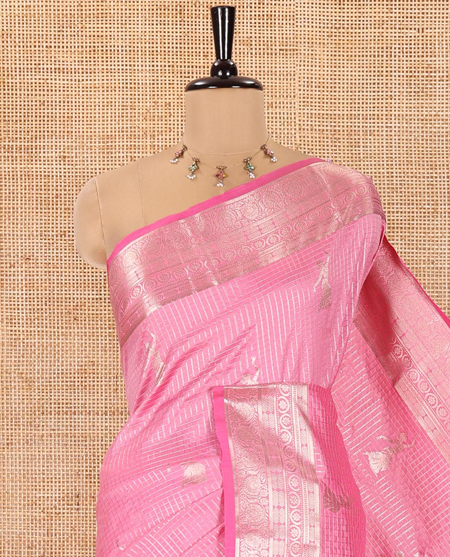 Pink Kanchi Silk Saree, Beautifully Bedecked with Zari Buttas and Zari Checks on Its Body, Highlighted by a Traditional Zari Design Border, Intricately Designed Pallu, and Paired with a Matching Blouse