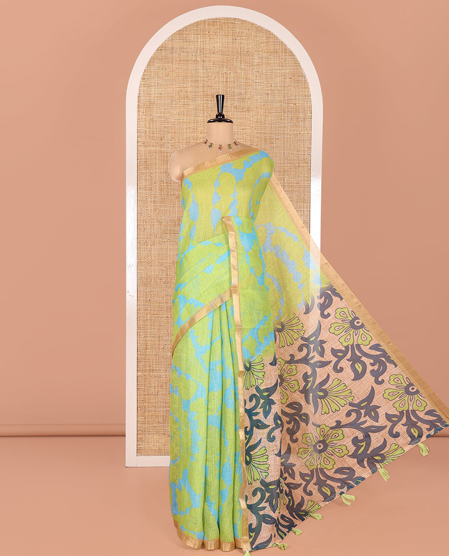 Parrot Green Linen Cotton Saree, Adorned with Shibori Print On Its Body, Subtle Piping Border, Pallu Steeped with Floral Vine Print, and Paired with a Printed Blouse