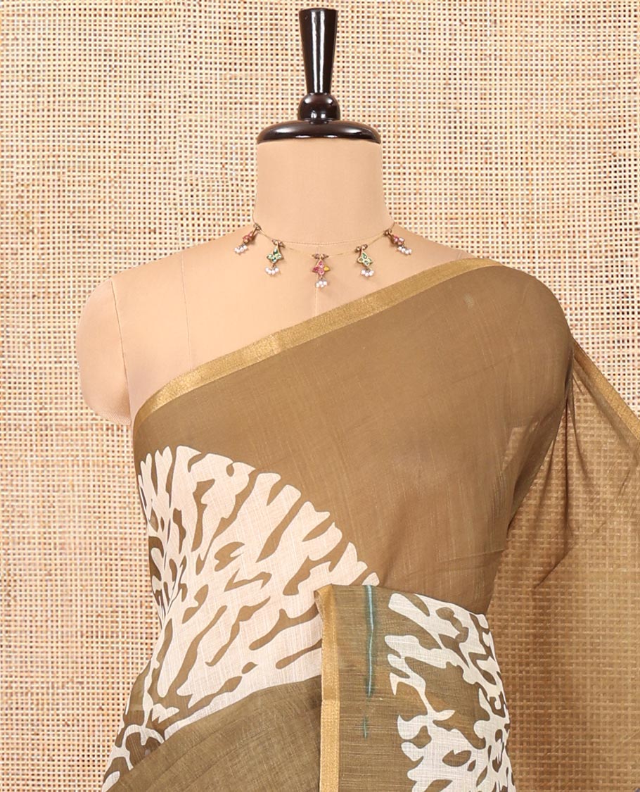 Olive Linen Cotton Saree, Ornamented with Floral Motifs Printed on Its Body, Subtle Piping Border, Complemented by a Contrast Floral Printed Blouse, and Paired with a Contrast Blouse