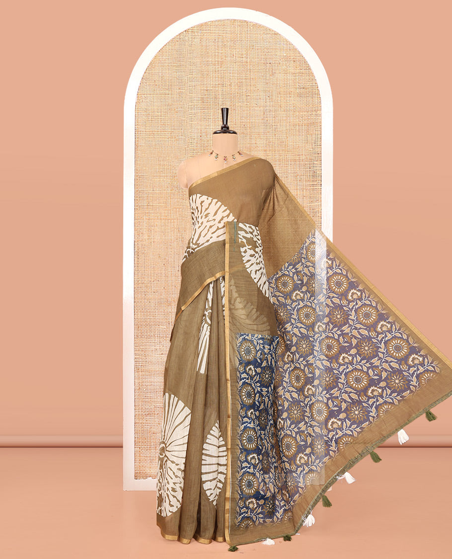 Olive Linen Cotton Saree, Ornamented with Floral Motifs Printed on Its Body, Subtle Piping Border, Complemented by a Contrast Floral Printed Blouse, and Paired with a Contrast Blouse