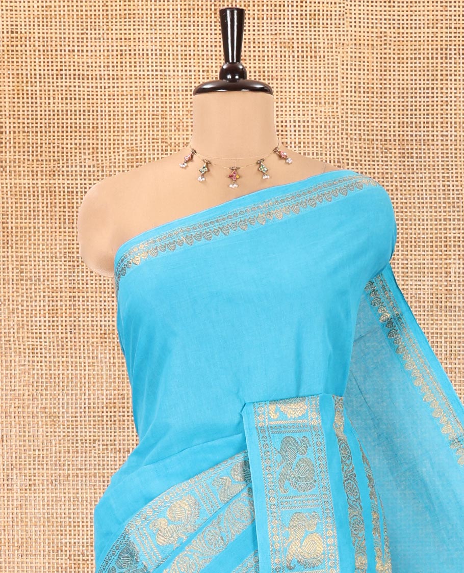 Blue Plain Sungudi Cotton Saree, Highlighted by Traditional Zari Border of Peacock and Floral Creeper Designs, Subtly Striped Pallu, and Paired with a Contrast Blouse