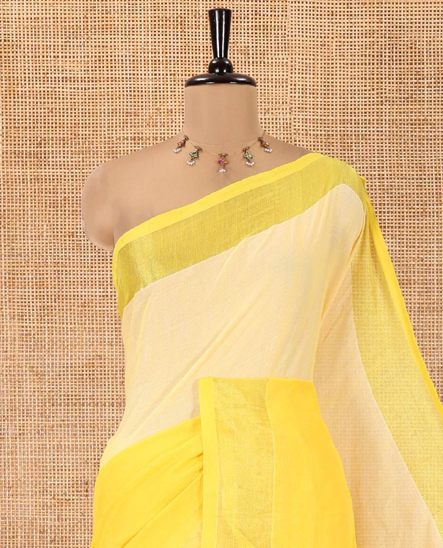 Yellow Khadi Mul Cotton Saree, Adorned with Half-And-Half-Style Double-Colour Dyed on Its Body, a Subtle Zari Border, Striped Pallu, and Paired with a Matching Blouse