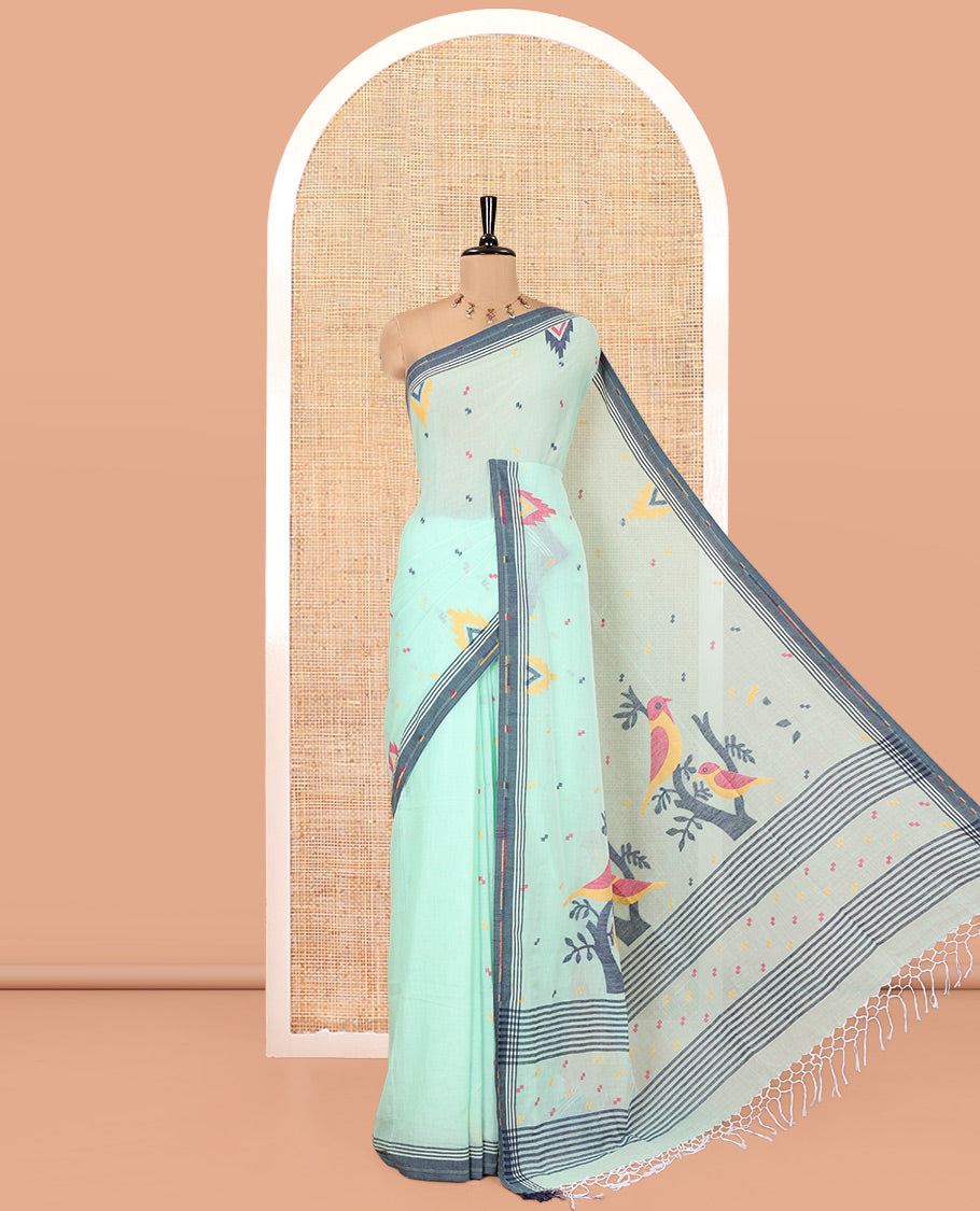 Sea Green Khadi Mul Cotton Saree, Decked Up with Meena Buttas All Over Its Body, Complemented by a Contrast Temple Border, Pallu of Jhamdani-Style Floral-Bird Weaving, and Paired with a Matching Blouse