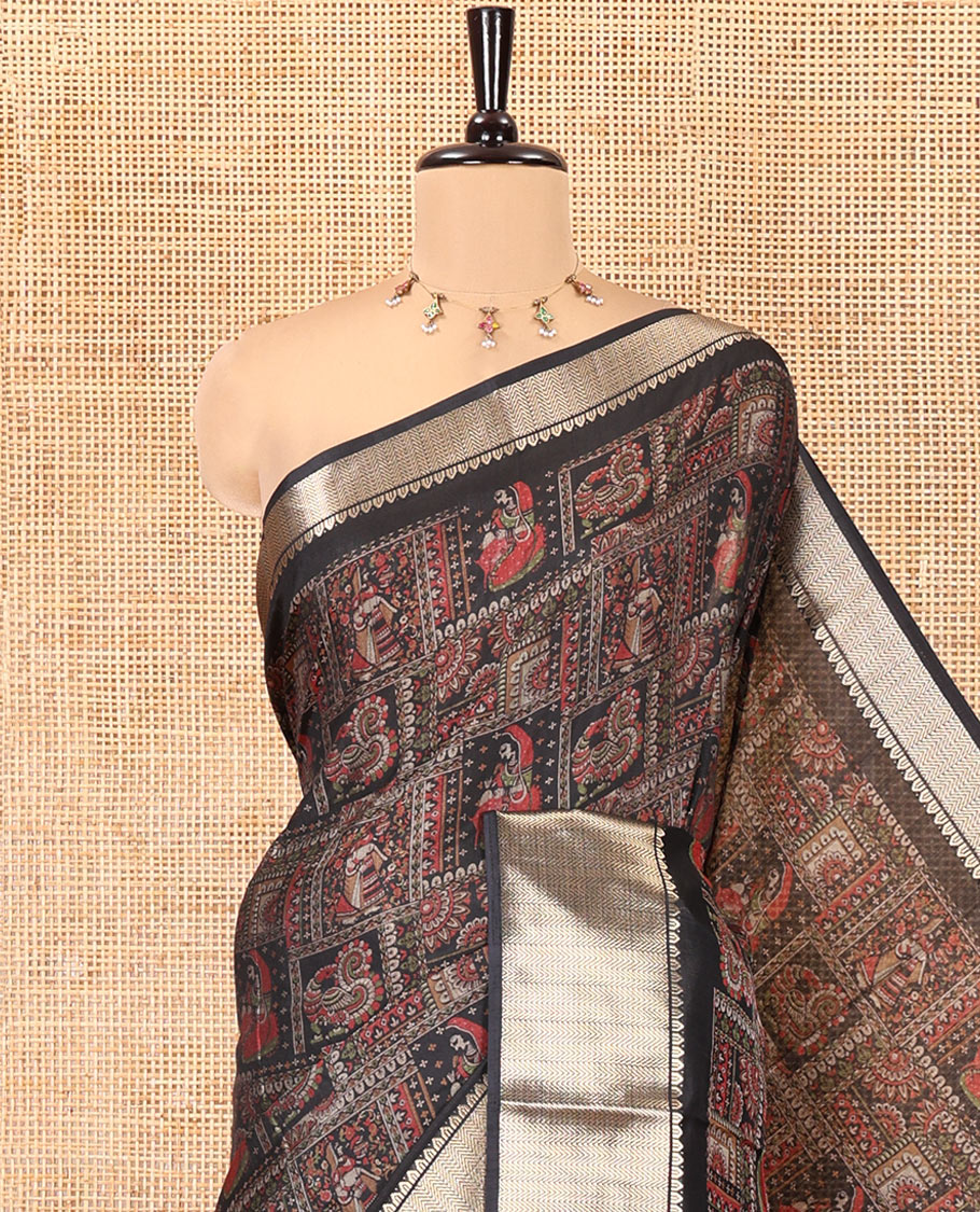 Black Dola Silk Saree, Embellished with Kalamkari-Style Peacock and Human Motifs Printed on Its Body, Highlighted by a Traditional Zari Design Border, a Self-Printed Pallu, and Paired with a Matching Blouse
