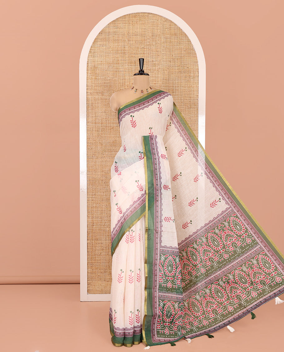Cream-Green Linen Cotton Saree Features Floral Buttas, Contrast Printed Border, Intricate Pallu, and a Contrast Blouse