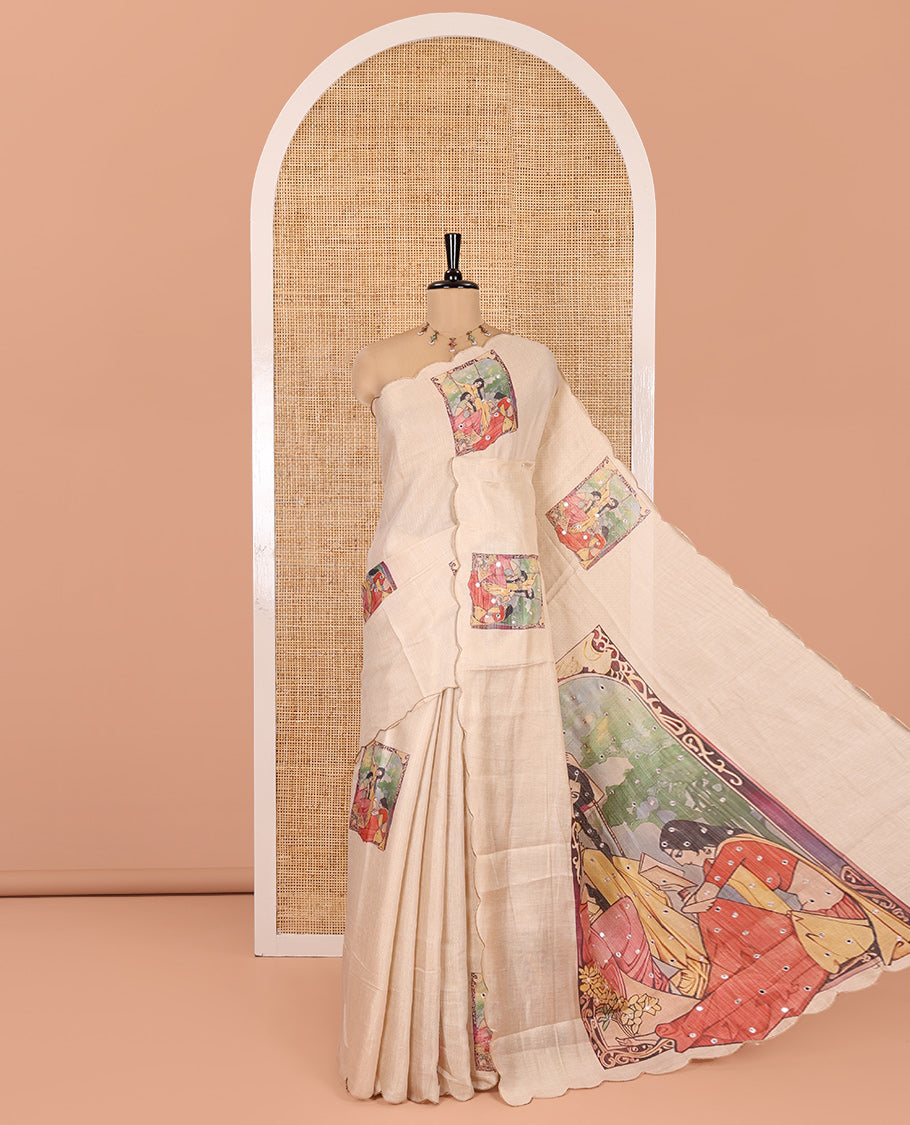 Gold Tissue Saree, Creatively Designed with Female Motifs Painting and Mirror work, a Scallop Border, and a Printed Blouse