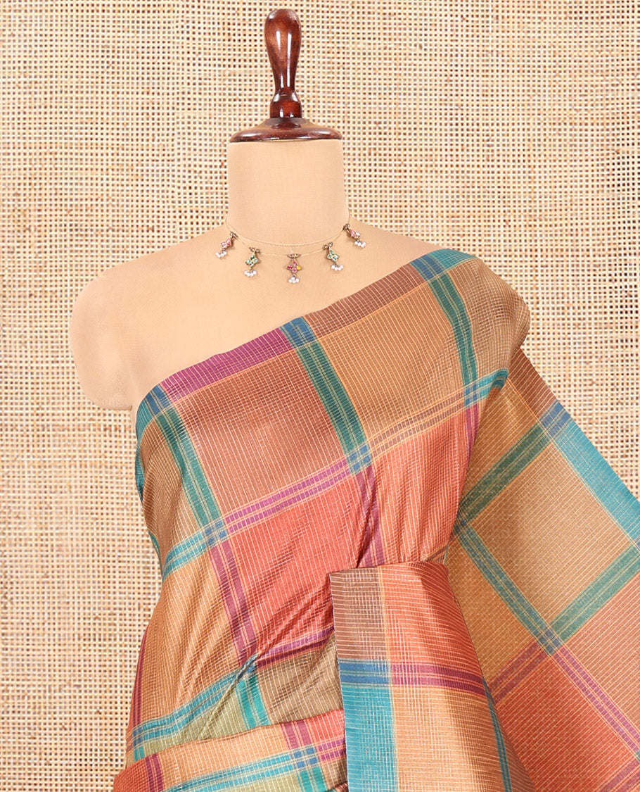 Borderless Rama Green Macro-Checked Katan Silk Saree, a Subtly Striped Pallu, and a Contrast Blouse