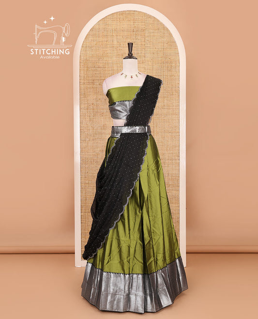 Green-black taffeta silk half-saree, plain & contrast temple & kathir boder skirt, matching blouse & contrast stonework scallop border syska georgette dhavani