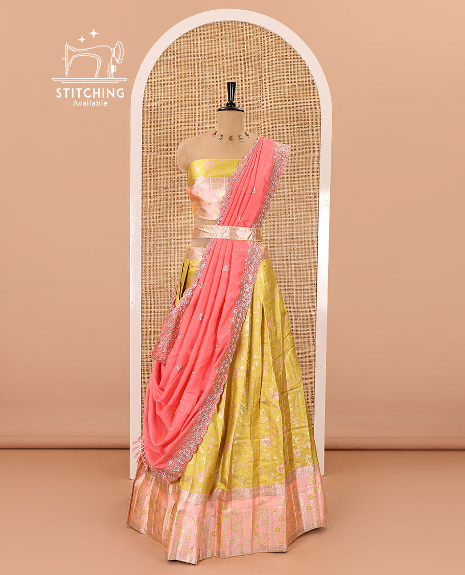 Yellow banarasi half-saree, floral jaal thread weave with contrast floral thread bordered skirt, a matching blouse, and scallop embroidered dhavani with belt
