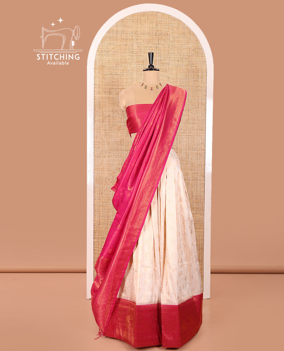 Cream and Magenta Banaras Softy Half-Saree Featuring Jacquard Design All Over the Skirt, Elevated with a Contrast Geometric Zari Design Border, Paired with a Jacquard Blouse, and a Banaras Softy Dhavani with Floral Jaal Jacquard Design