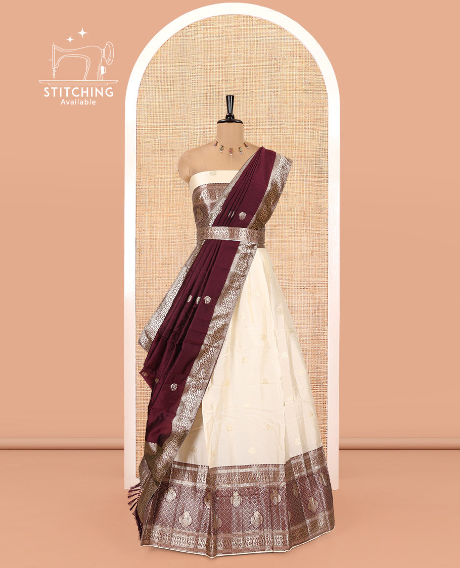 Cream-Wine Semi-Banarasi Half-Saree Set Featuring Buttas Skirt, Contrast Traditional Border, a Matching Blouse, and a Banaras Dhavani