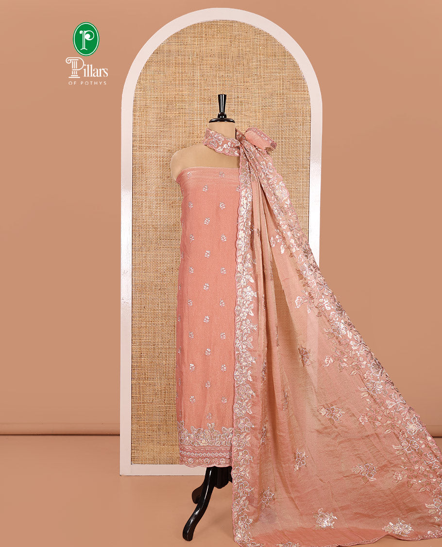 Peach Material Churidar Set, Artfully Detailed with an Floral Motifs Embroidered on Its Nc Moss Organza Top, Plain Santoon Bottom, and Nc Moss Organza Scallop Dupatta of Floral-Leaf Embroidery