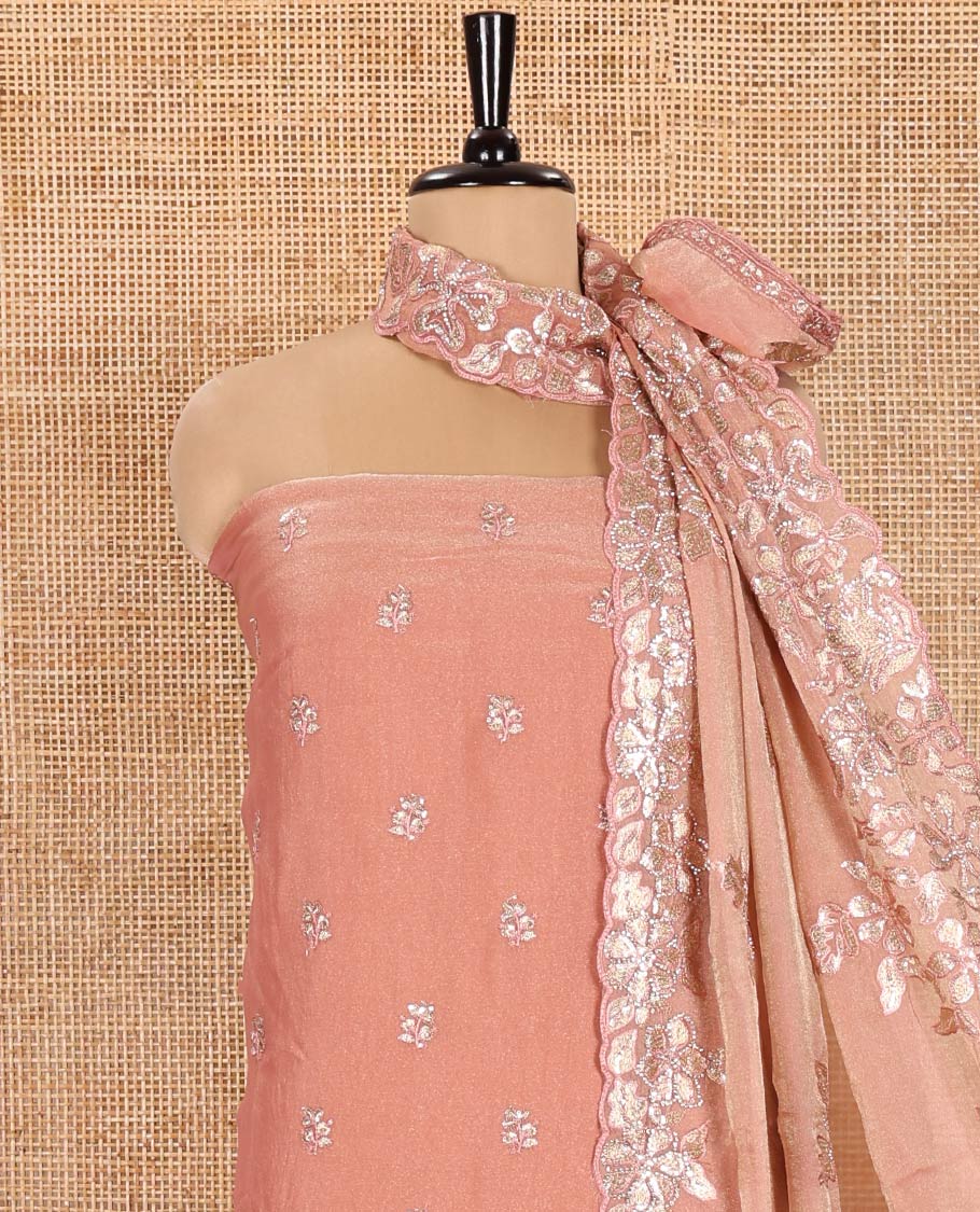 Peach Material Churidar Set, Artfully Detailed with an Floral Motifs Embroidered on Its Nc Moss Organza Top, Plain Santoon Bottom, and Nc Moss Organza Scallop Dupatta of Floral-Leaf Embroidery