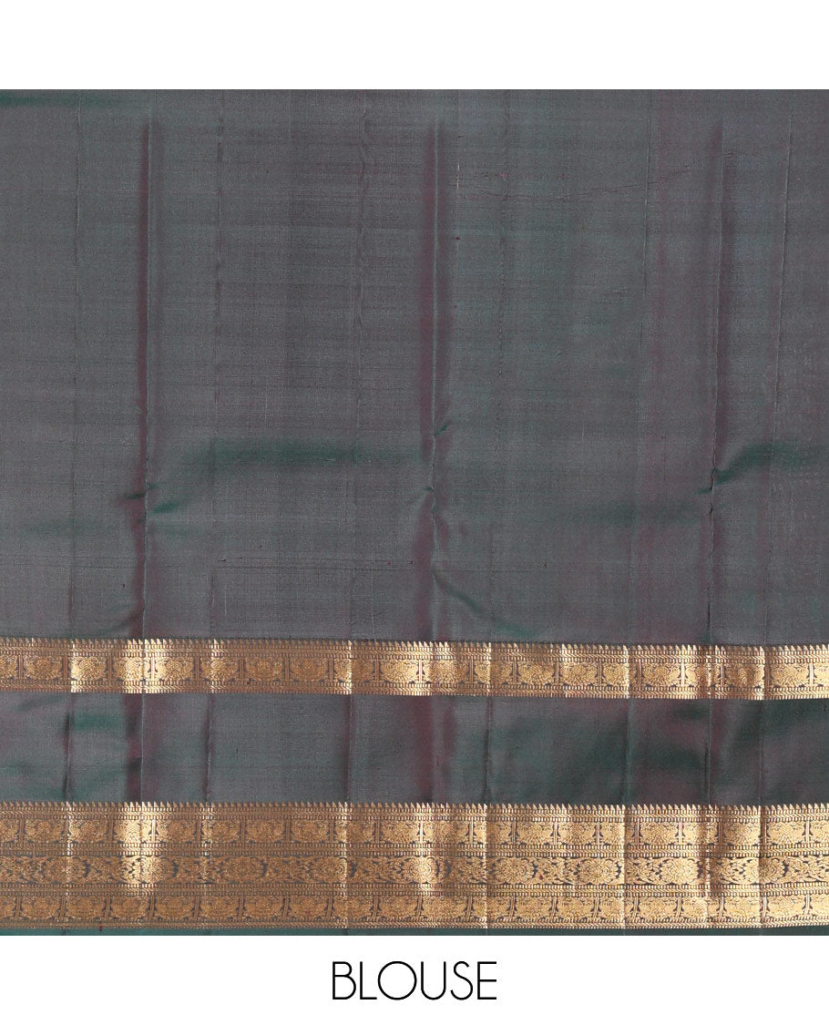 Magenta Vasundhara Silk Saree Featuring Zari Checks and Annam Chakram Buttas, Complemented by a Contrast Rettai Pettu Border with Muthu, Yaali, and Kodi Visiry Designs, a Jaal Pallu, and a Contrast Zari-Bordered Blouse