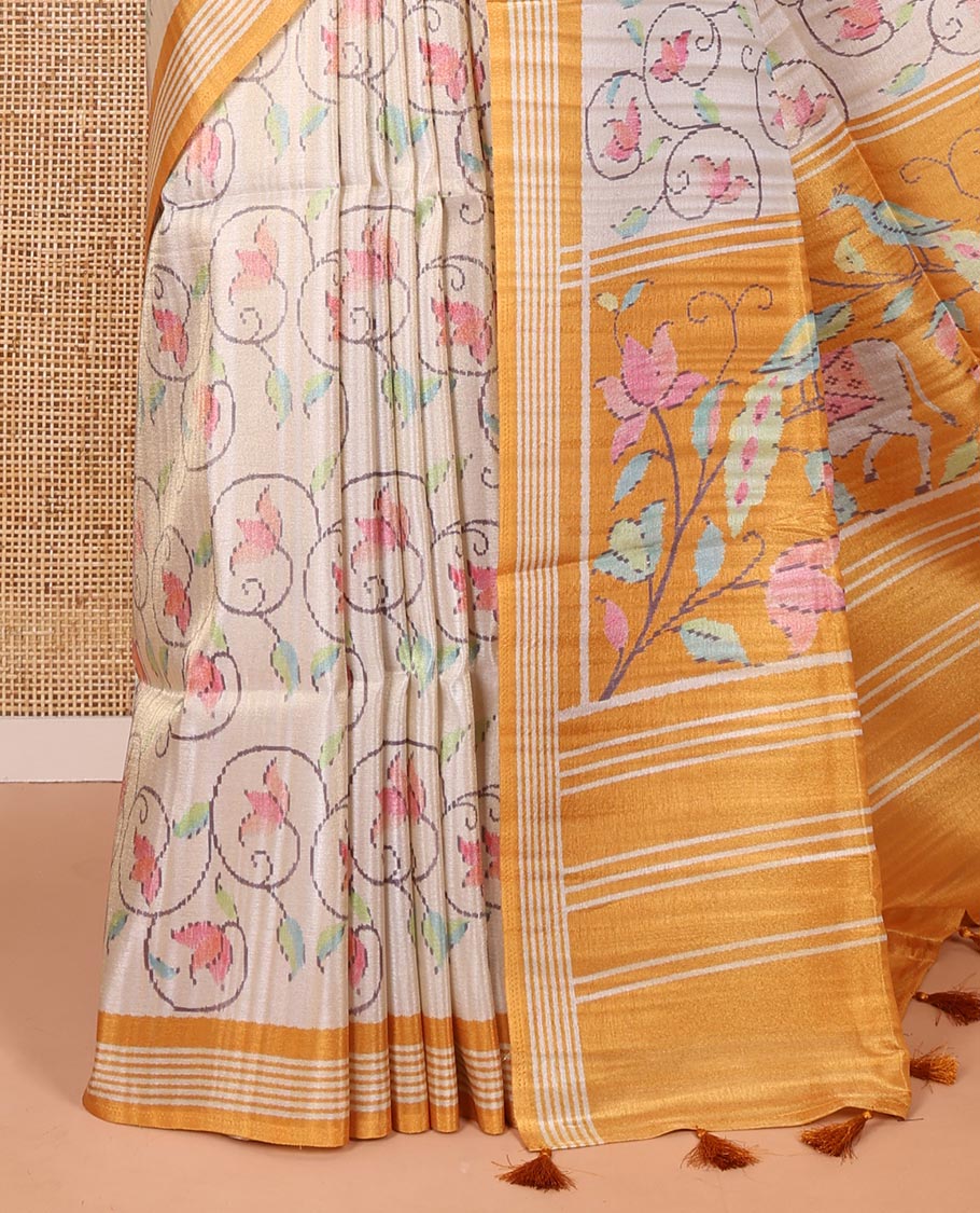 Chikku-yellow floral vine printed tissue patola saree, contrast striped border, pallu of floral and Pichwai cow motifs print, and a plain blouse