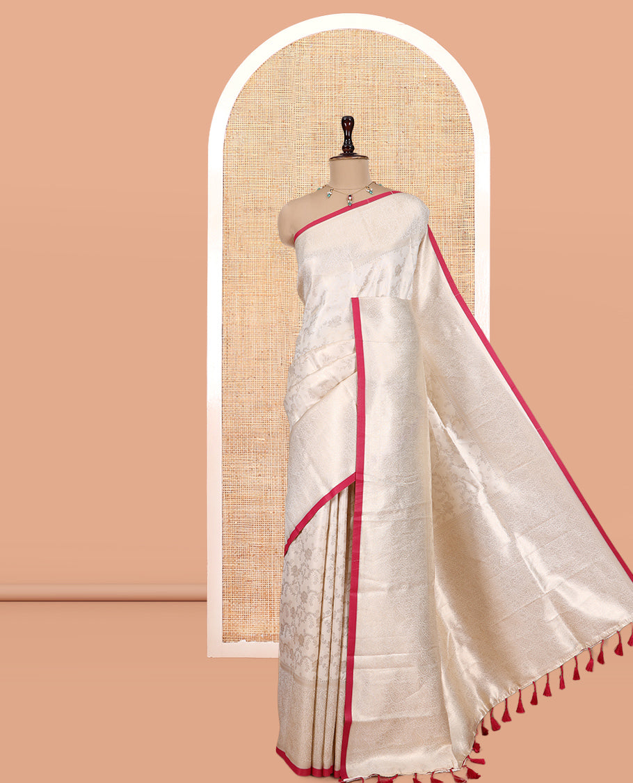Off-White-Maroon Semi-Silk Saree, Adorned with Floral Jacquard Design, a Zari Paisley Border, and a Contrast Blouse