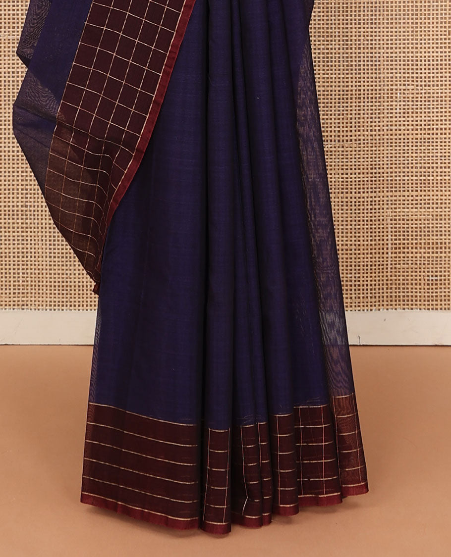 Navy blue plain silk cotton saree, contrast checked border, and striped pallu