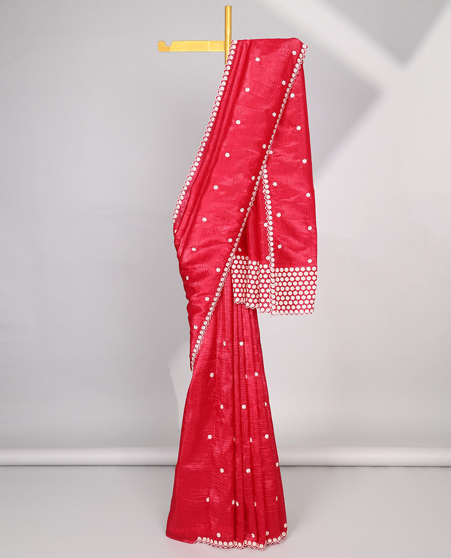 Pink Crushed Tissue saree with scallop motif border and intricate motif embroidery pallu