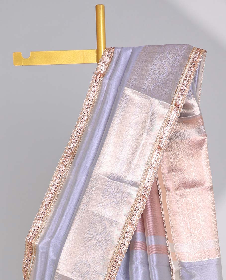 Purple tissue saree with self zari design border & intricate zari design pallu