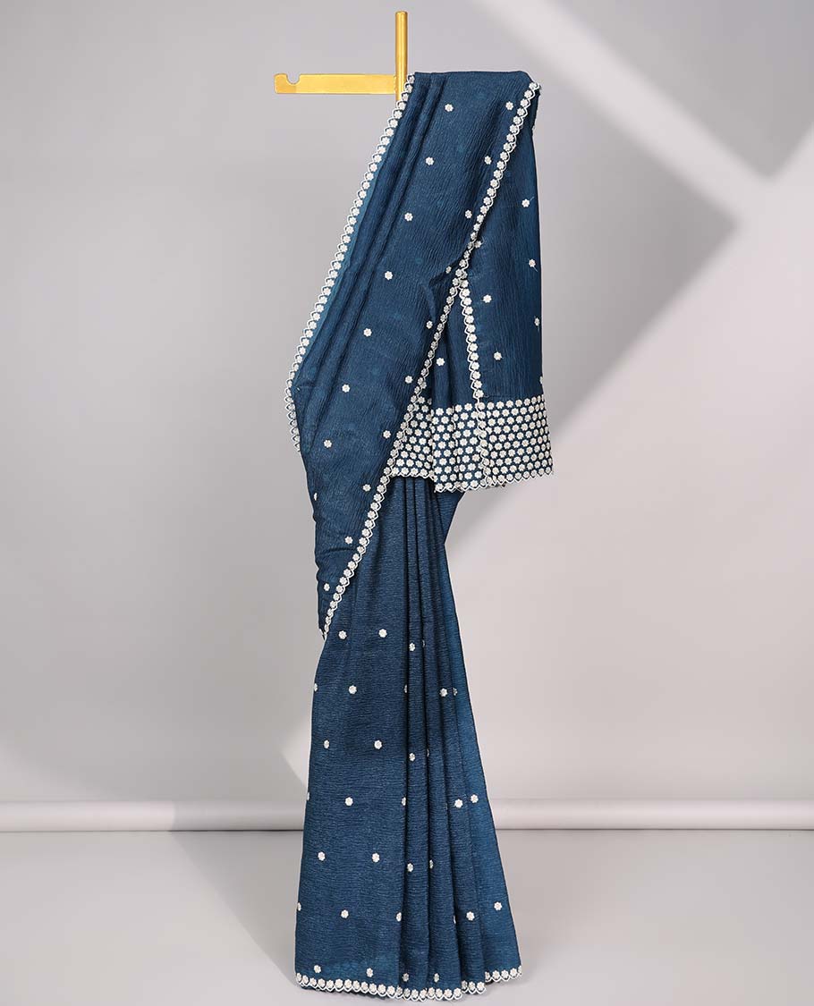 Red crushed tissue saree with all-over floral motifs embroidered & floral scallop border