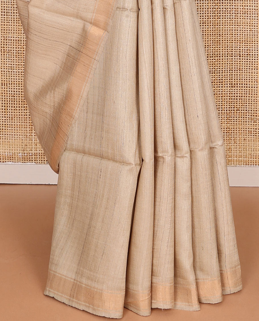 Sandal plain design tussar saree, zari border & contrast pallu of patola-style elephant motifs print